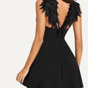 Black winged dress